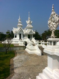 These smaller buildings sit behind the main temple structure.