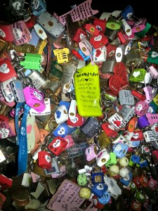 Locks of love. Couples buy locks and write their names on them, then throw away the key as a testament to their undying love *gag*. 