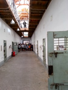 Inside prison building no.11. A school group tour looks into the cells in the background. 