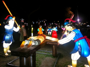 Lantern guards torture bad guys in a recreation of the old days.