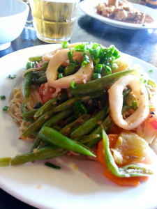 Seafood with veggies and noodles. 